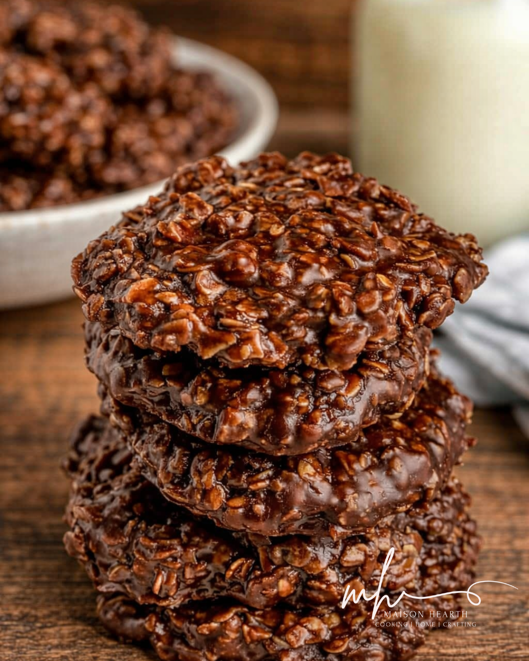 Batch of classic no‑bake chocolate cookies setting on parchment, highlighting their fudgy, oat‑filled texture.
